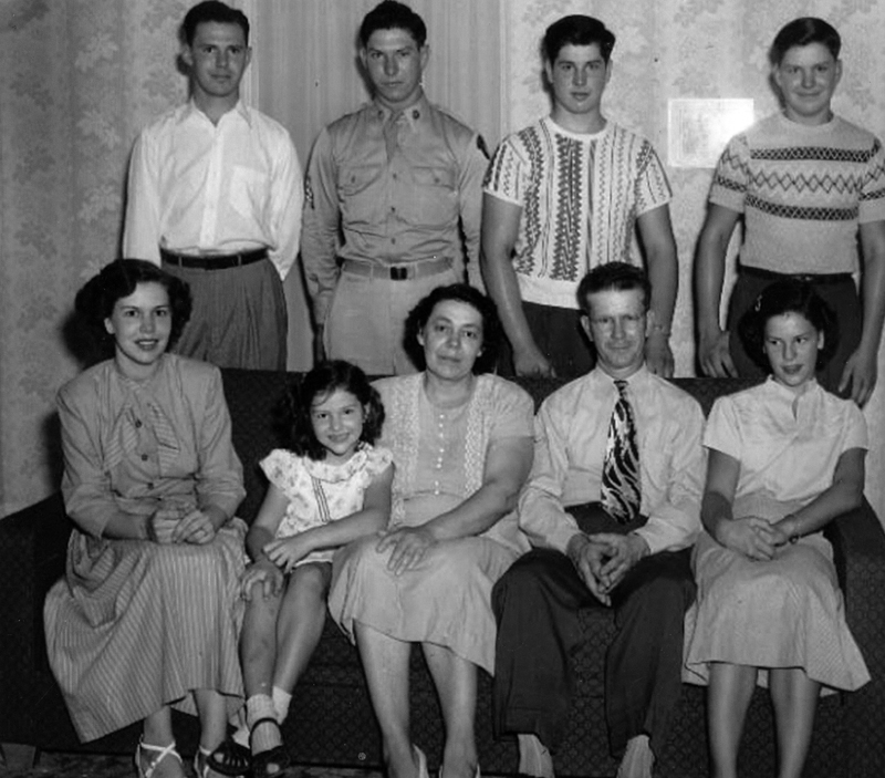 A photo of the Burkholder family in the early 1940s. Front row, from left: Phyllis, Dorothy, Dagmar (mother), Elmer (father), and Joan. Back row, from left: Jack, Kenneth, Keith, and Wayne. (Photo courtesy Burkholder family)