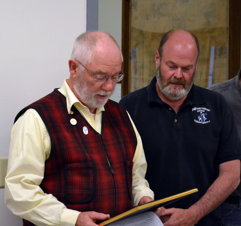 Selectman Frank Ober (left) presents Whitefield Fire and Rescue Chief Scott Higgins with a letter of appreciation from the Whitefield Select Board on May 11, 2011. The letter recognized the department for their response to four separate structure fires in a single week over the winter. (LCN file)