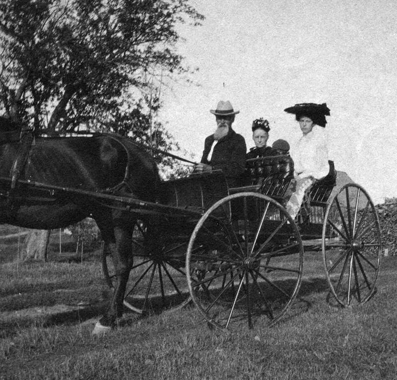 William J. Knowlton, daughter Martha, and Mrs. Knowlton on their way to church, being pulled by Knowlton's favorite black horse. (Photo courtesy Calvin Dodge)