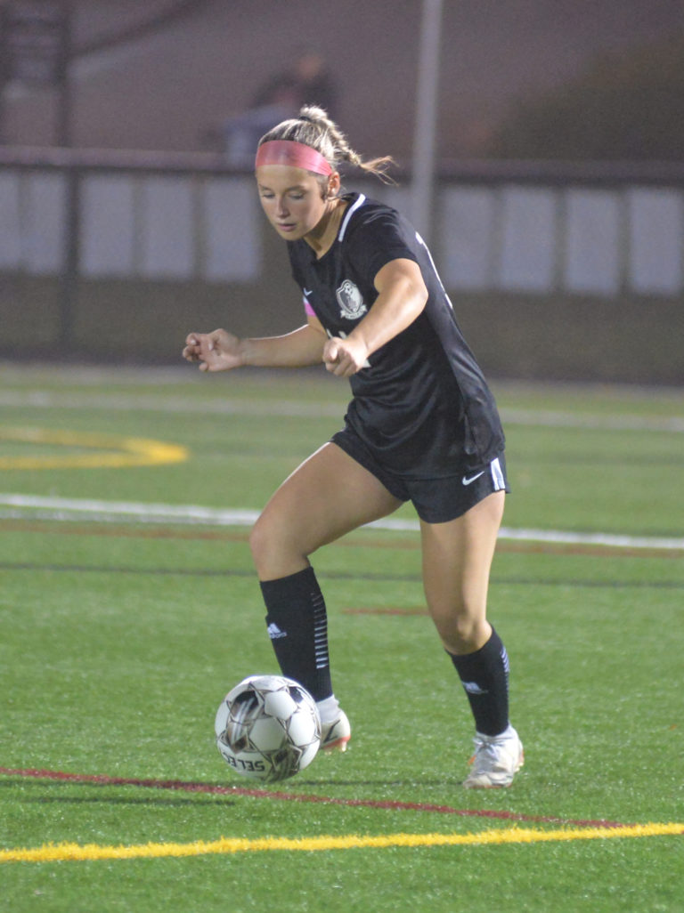 Nicole Hammond clears the ball out of LA's defensive end. (Paula ...