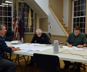 From left: Darin Carlucci, chair of the Bristol School Committee, speaks to Selectmen Paul Yates and Chad Hanna about a $6 million-plus plan for the renovation of Bristol Consolidated School on Wednesday, Oct. 19. The committee plans to present a firm bid to the select board by the end of the year and bring the proposal to voters at the annual town meeting in March. (Evan Houk photo)