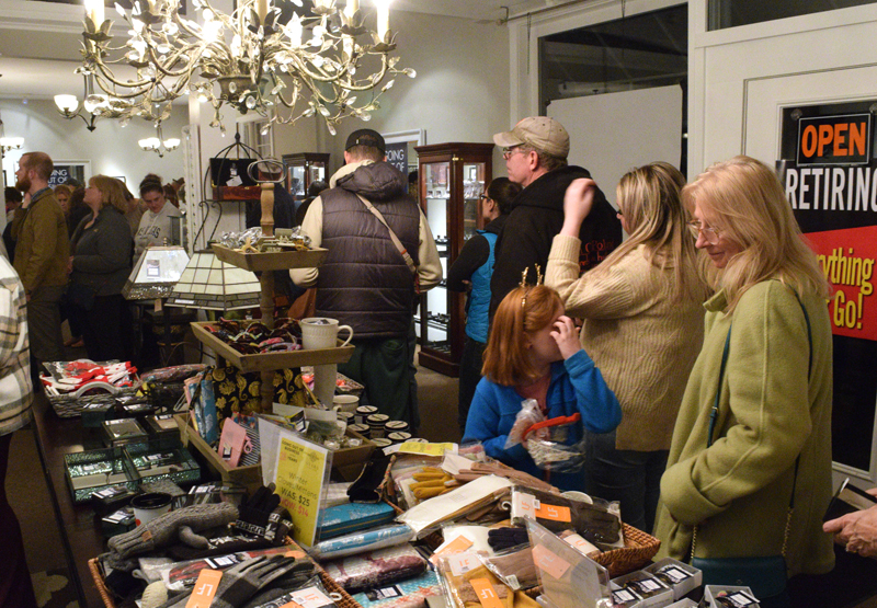 Customers pack Stars Fine Jewelry in downtown Damariscotta for the first night of the store's retirement sale on Wednesday, Nov. 9. Frieda and John Hanlon, owners and operators since starting the business in 1994, want to step back, relax, and spend more time at home and traveling around Maine. (Evan Houk photo)