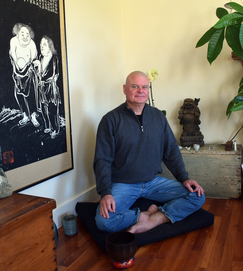 Jizai Don Sorterup sits in his home in Damariscotta. Sorterup is an ordained Zen Buddhist priest and hosts a sangha, or Zen Buddhist community, which gathers to meditate on the first and third Sundays of the month. (Evan Houk photo)