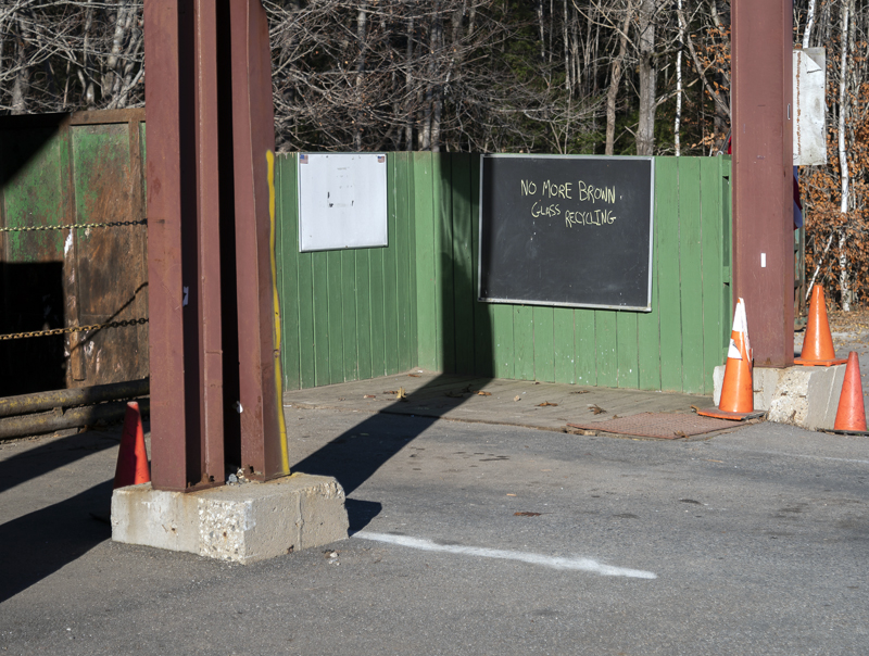 A sign indicates that brown glass recycling is no longer accepted at the Nobleboro-Jefferson Transfer Station on Wednesday, Nov. 2. The bin for brown glass was contaminated by the addition of other items. (Bisi Cameron Yee photo)
