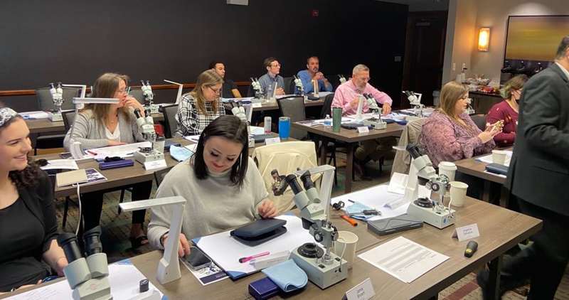 Stacy Nordlund, director of education for De Beers North America, visited Days Jeweler's employees in October to teach the Introduction to the 4Cs course. (Photo courtesy Days Jewelers)
