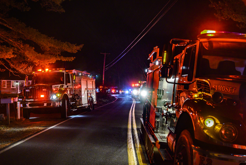 Emergency vehicles line Bristol Road during a structure fire in Bristol on Friday, Dec. 2. Six area departments responded to the scene. (Bisi Cameron Yee photo)
