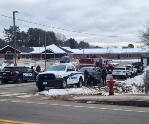 Emergency responders stage outside of Great Salt Bay Community School in Damariscotta after school officials received a hoax bomb threat the morning of Wednesday, Dec. 21. (Alec Welsh photo)