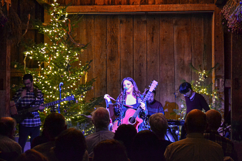 Cara Brindisi prepares to perform her first song of The Snow Globe Tour performance with her band at Wanderwood in Nobleboro  on Saturday, Dec. 3. (Lydia Simmons photo)