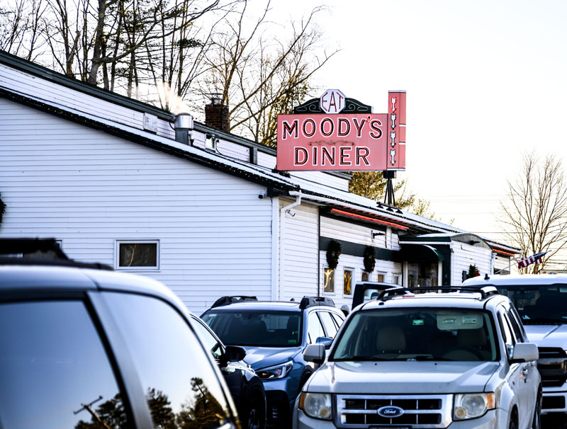 Cars fill the parking spaces outside Moody's Diner in Waldoboro on Monday, Dec. 12. Nancy Genthner was a co-owner of the popular eatery founded by her parents until well into her 80s. (Bisi Cameron Yee photo)