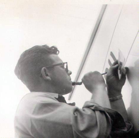 A younger Schuyler Fairfield Sr., doing what he became known for, painting a sign, on a building, free hand. (Photo courtesy Fairfield family)