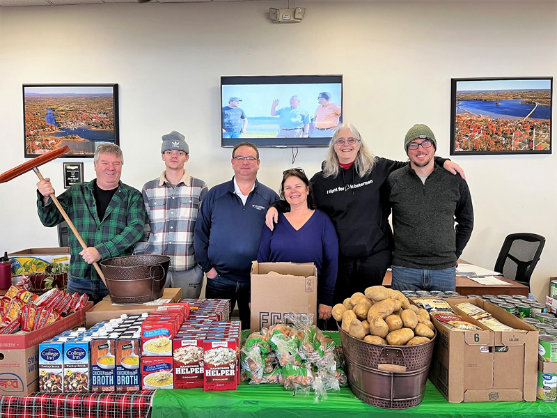 Members of the Wiscasset Ford pose before opening for their first food pantry. (Photo courtesy Healthy Lincoln County)