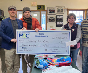 Members of the Bristol Masonic Lodge No. 74 present a donation to the Bristol based non profit Caring for Kids. Shown, from left: Masons Irving True, Dennis Boyd, and Secretary Bill Smith, Caring for Kids founder Jenny Pendleton, and Mason Jim Hazell. (Photo courtesy Jon Prime)