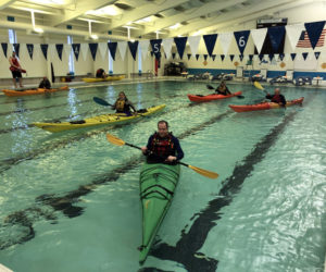 From left: Tai Grosjean, Claire Sommer, Bob Barkalow, Rick Taylor, and Don Celler practice their paddling skills at the Boothbay Region YMCA on Saturday, Jan. 14. (Photo courtesy Matt Lutkus)