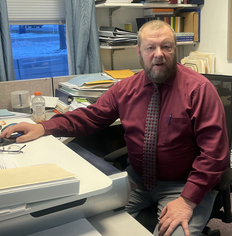 Det. Terry Michaud works at his desk in the Lincoln County Sheriffs Office in Wiscasset last month. Michaud officially retired on Wednesday, Feb. 1, ending a 39-year career in law enforcement. Michaud spent the final 14 years of his career with the LCSO. (Sherwood Olin photo)