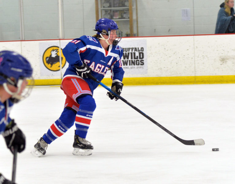 Marley LeBel brings the puck up the ice for Mt.Ararat. (Paula Roberts photo)