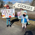 Girl Scout Hold Drive-Thru Cookie Sale