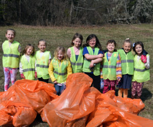 Members of Bristol Girl Scout Troop No. 1560 spent part of their morning participating in the Elmer Tarr Roadside Cleanup on Saturday, April 22. Troop members recovered a large of amount plastic, many cigarette butts, and even a couple animal bones as they cleaned up a section of the Bristol Road in Pemaquid. (Sherwood Olin photo)