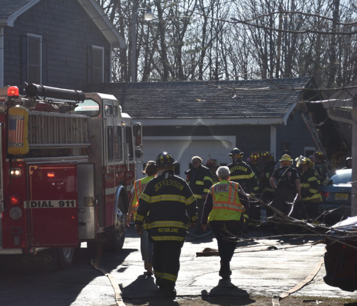 First responders gathered at Jefferson home where a garage caught fire on Thursday, April 13. Four area fire departments responded. (Elizabeth Walztoni photo)