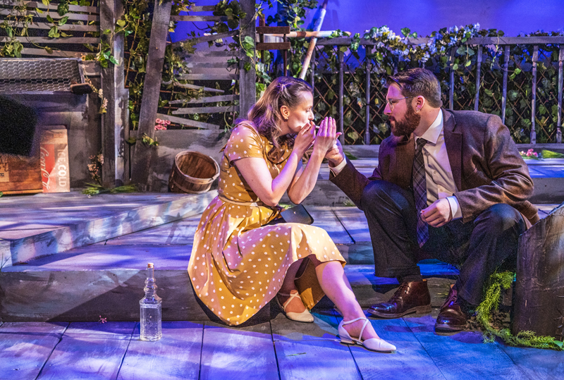 Joe Lugosch, as Matt Friedman, lights a cigarette for Nanette Fraser, as Sally Tally, during a dress rehearsal for Â“TalleyÂ’s FollyÂ” at the Poe Theater in Newcastle on Friday, April 21. The intimate gesture speaks to the closeness required to stay in character as the only two actors in the 100-minute performance. (Bisi Cameron Yee photo)