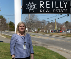 Kellie Peters stands outside her real estate office at 29 River Road in Newcastle earlier this month. The Great Salt Bay Schools gifted and talented teacher, Peters is leaving a 27-year career in education at the end of this school year to begin a full-time career as a real estate agent. (Sherwood Olin photo)
