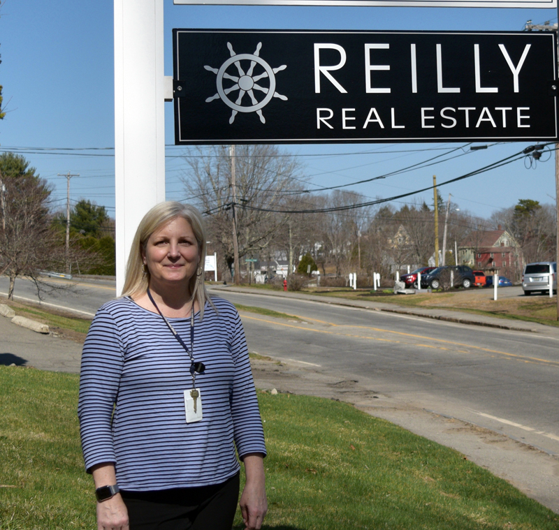 Kellie Peters stands outside her real estate office at 29 River Road in Newcastle earlier this month. The Great Salt Bay SchoolÂ’s gifted and talented teacher, Peters is leaving a 27-year career in education at the end of this school year to begin a full-time career as a real estate agent. (Sherwood Olin photo)