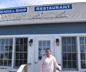 Brooke Cotter stands outside The Seagull Shop at Pemaquid Point, which she pruchased in February after 13 years working there. Cotter managed the shop and restaurant for co-owners and former Tim and Betsey Norland from 2017 until purchasing the business in full this January. (Elizabeth Walztoni photo)