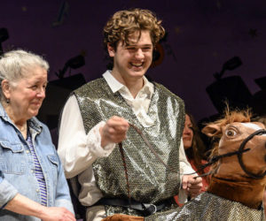 Zora Margolis and Harrison Pierpan share a chuckle while practicing a scene with Buttercup, Prince Tophers valiant steed, during a rehearsal for Cinderella at Lincoln Theater in Damariscotta on Sunday, April 30. (Bisi Cameron Yee photo)