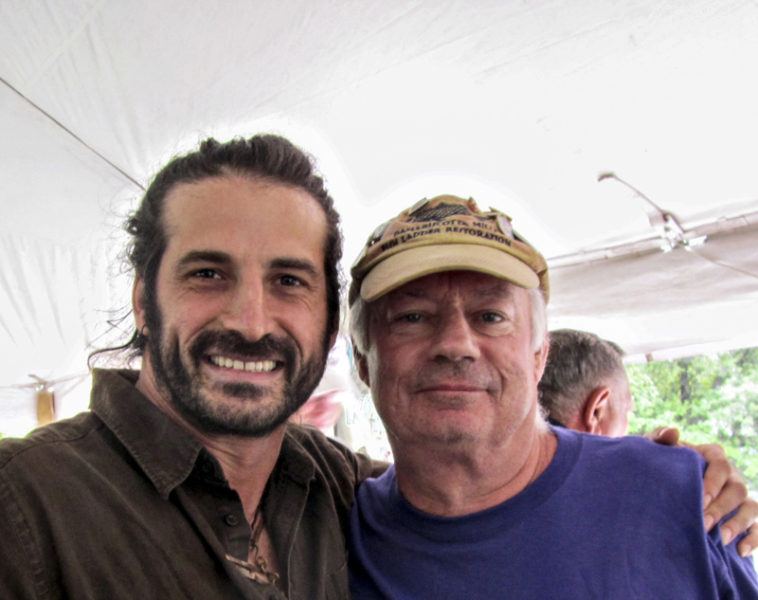 Adam Ezra (left) poses for a photo with Bobby Whear, owner of the Mill Pond Inn. The two have become good friends since Ezra first performed a benefit concert for the Damariscotta Mills Fish Ladder. (courtesy photo)