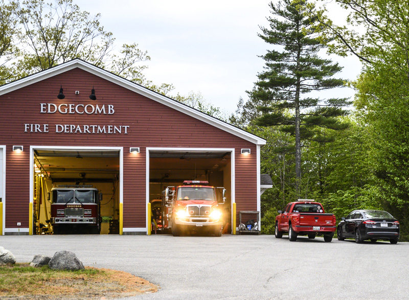 A fire truck backs into its bay at the Edgecomb Fire Department following volunteer firefighter training on Tuesday, May 16. The town's select board approved expending $12,000 in ARPA funds to support the training. (Bisi Cameron Yee photo)