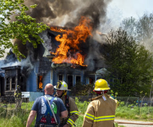 Fire engulfs a house in Jefferson on Tuesday, May 23. A mother and three children escaped the blaze. (Bisi Cameron Yee photo)