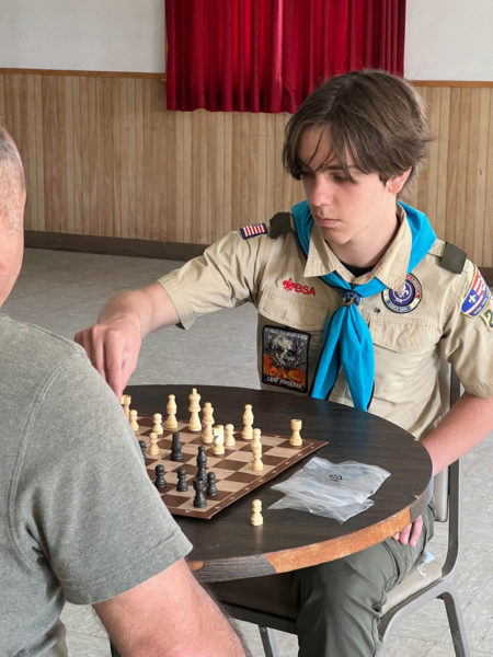 Blaise Eddy Blouin of Boy Scout Troop 213 competes in the District Scouting Chess Tournament on Saturday, May 13. (Courtesy photo)