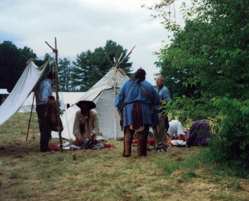 Wabanaki clothing varied from tribe to tribe and from year to year. They never wore the kind of Â“war bonnet,Â” head piece made famous later by natives of the Great Plains. This picture, taken during a Wabanki reenactment encampment in Sheepscot in 2003, shows them dressed quite plainly. (Photo courtesy Newcastle Historical Society)