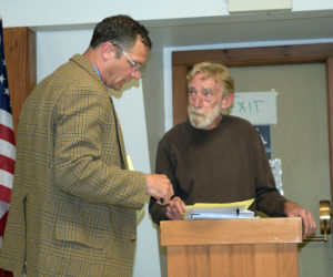 Attorney Benjamin J. Smith (left) confers with his client Ralph Hilton during Hilton's presentation at an ethics hearing involving Alna First Select Board member Ed Pentaleri Thursday, June 8. Hilton filed the complaint April 27, accusing Penatleri of a conflict of interest, bias, and perjury. (Sherwood Olin photo)