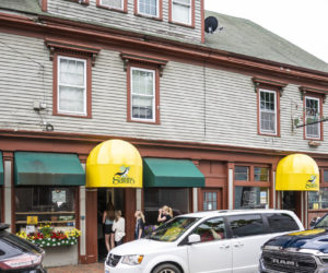 A party of nine enters Sarahs Cafe in Wiscasset on Wednesday, June 14. The restaurant, which has served Wiscasset for more than 30 years, is closing Friday, June 23. (Bisi Cameron Yee photo)