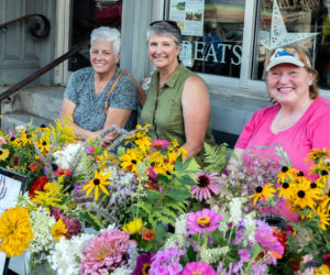 Wiscasset Garden Club, a participant at Wiscasset Art Walk since 2016, tables at the walk in 2022. The club offers a happy place to stop for fresh flowers or a friendly chat. (Photo courtesy Bob Bond)