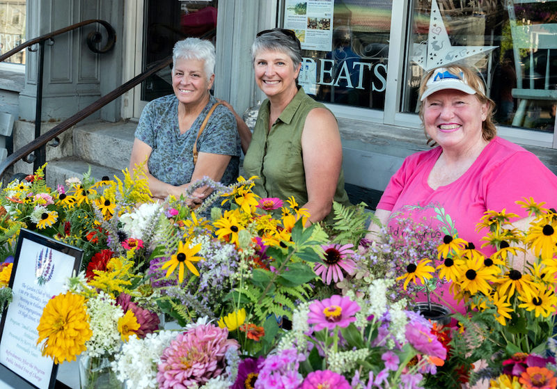 Wiscasset Garden Club, a participant at Wiscasset Art Walk since 2016, tables at the walk in 2022. The club offers a happy place to stop for fresh flowers or a friendly chat. (Photo courtesy Bob Bond)