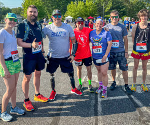 A team from Dow Furniture proudly participated in the Miles for Mills 5K at the Brunswick Landing May 28. The event that attracted over 1,300 registrants and generated $160,000 for the Travis Mills Foundation. From left: Elise Wallace, Matt Norton, Travis Mills, Randy Joubert, Rebecca Wylie, Wilmot Dow, and Conor Glasier. (Photo courtesy Dow Furniture)