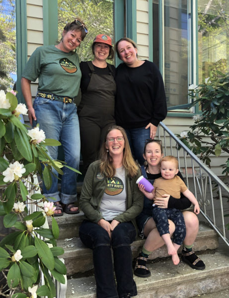 From left: Haley Bezon, Jess Donahoe, Lauren Cucci, Hannah Walsh, Lauren Talek, and young Rudy at Hearty Roots' new location in Damariscotta. (Photo courtesy Hearty Roots)