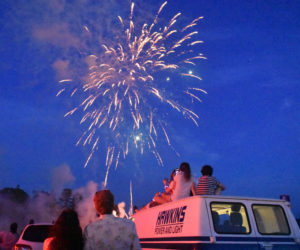 Spectators fill Damariscotta's back parking lot to watch a fireworks display on Tuesday, July 4, marking the close of a long weekend celebrating the town's 175th anniversary as well as Independence Day. Tuesday's festivities also included a parade and concert. (Elizabeth Walztoni photo)