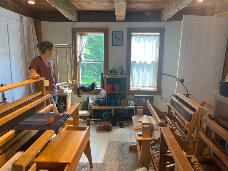 Hilary Crowell in her weaving studio in Wiscasset. Crowell has owned and operated The Cultivated Thread since February 2020. (Frida Hennig photo)
