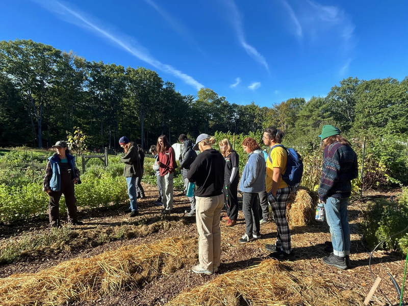 Erica Berman (left) gives a farm tour at Veggies to Table. (Photo courtesy Veggies to Table)