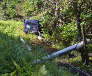 A motor-vehicle crash the morning of Tuesday Aug. 1 closed Route 129 in South Bristol to through traffic for about three hours before power was restored. (Johnathan Riley photo)