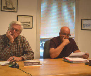 Waldoboro Select Board members Michael Thayer (left) and John Blodgett listen to a presentation on Tuesday, Aug. 22 by members of the RSU 40 Board of Directors about an $81 million capital improvement plan and bond proposal. While representatives presented all items in the plan as necessary, the select board asked for a priority list to be made. (Johnathan Riley photo)