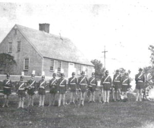 The Chapman-Hall House in the late 19th century. The Damariscotta Fife and Drum Corp stand in front of the building. (Photo courtesy Lincoln County Historical Association)