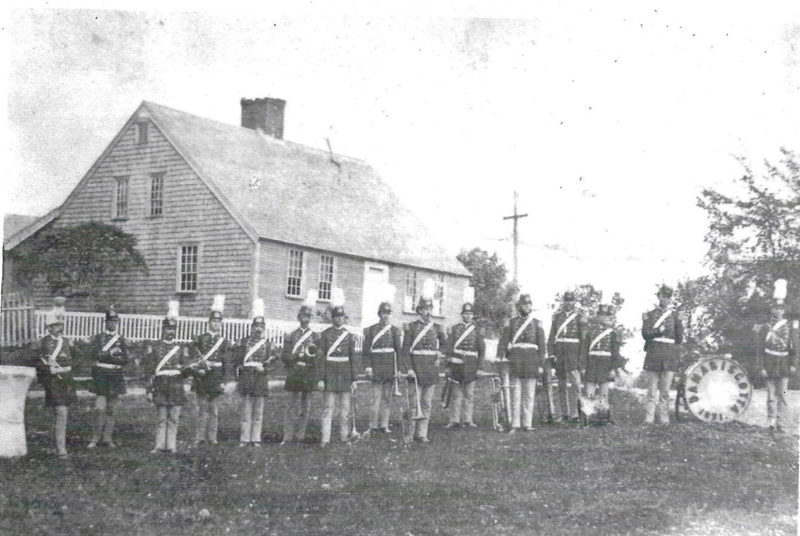 The Chapman-Hall House in the late 19th century. The Damariscotta Fife and Drum Corp stand in front of the building. (Photo courtesy Lincoln County Historical Association)