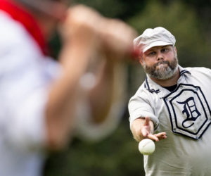 Justin Kirk, of the Dirigio Vintage Base Ball Club, pitches to a batter during a game in Waldoboro on Sunday, Aug. 13, played by 1864-era rules. Under the old-time rules, there were no gloves and pitches were underhand, only. (Photo courtesy Troy R. Bennett, Bangor Daily News)