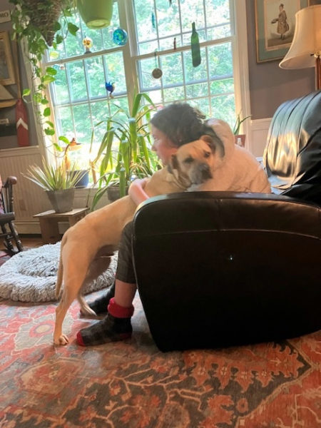 Henry and "hooman" Eli share the love. (Photo courtesy L.D. Porter)