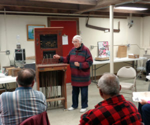 May Davidson captivates an audience talking about the old telephone switchboard in the basement of the old Jefferson town house, remembering her experiences working for the Nash Telephone Co. during a presentation. The switchboard and old telephones are on display at the historical society's open houses this summer. (Courtesy photo)