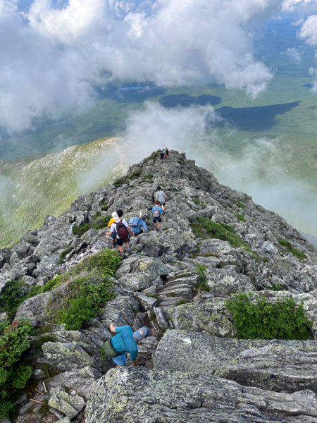 Campers descending down the Hunt Trail on Mount Katahdin in July. (Photo courtesy Kieve Associate Director Caddy Brooks)