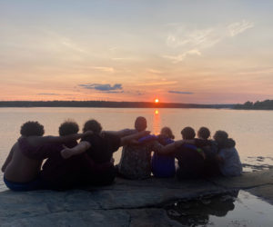 Teens connect after a day of adventure camp at Hearty Roots. (Photo courtesy Hearty Roots)